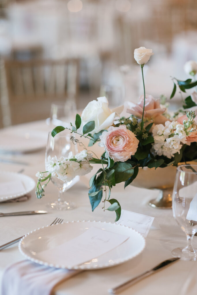 Newlyweds celebrating under string lights at Hazelnut Farm, a timeless Louisville wedding venue.