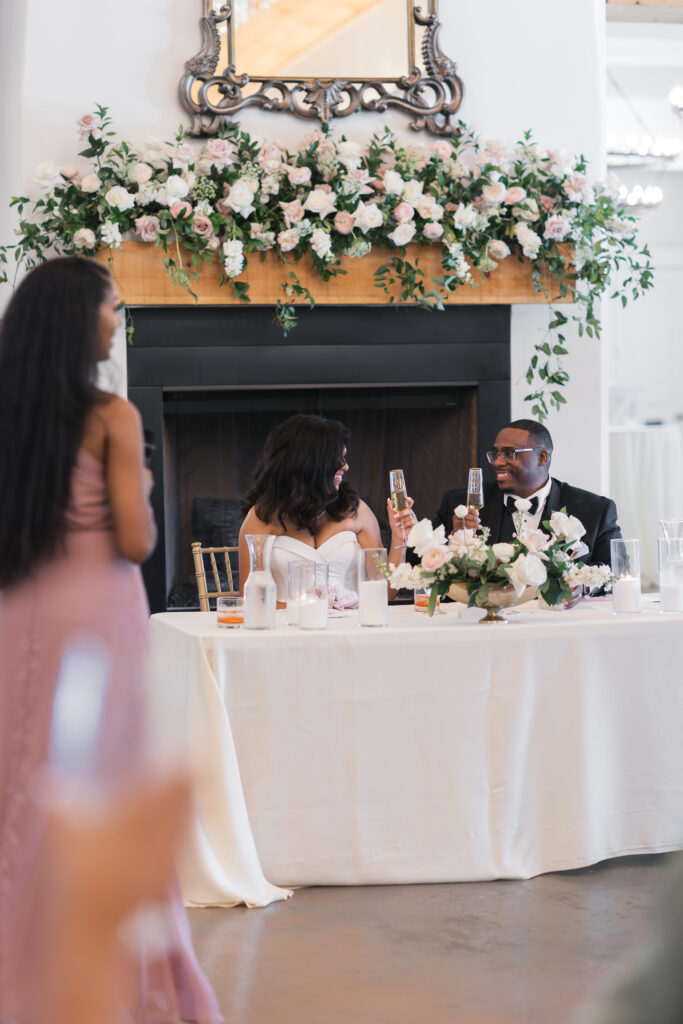 Louisville wedding photographer captures emotional first look at Hazelnut Farm surrounded by lush Kentucky greenery.